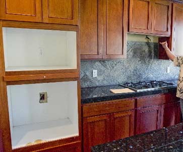 This foreclose home has  been stripped of the oven, microwave and range vent, together with 29 missing door knobs, 28 light fixtures, 10 floor registers, eight faucets or shower heads and one air conditioner